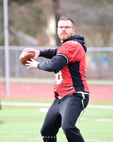 Kyle Zajack preparing to throw a football
