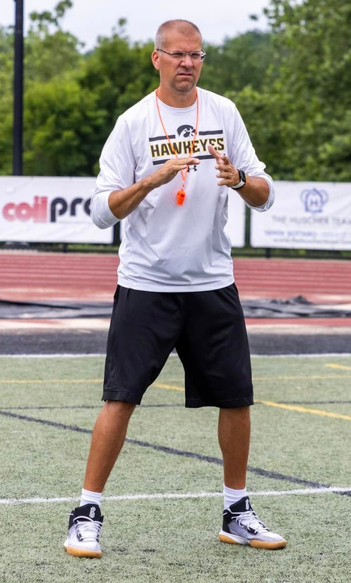 Coach Craig demonstrating technique during a training session